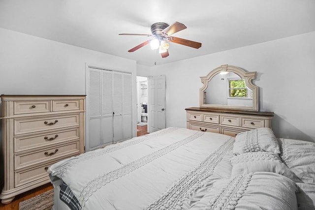 6404 W 85th Pl, Burbank, IL 60459 - bedroom with dark wood finished floors, a closet, and a ceiling fan