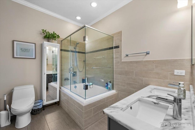 2447 W Walton St Unit 1, Chicago, IL 60622 - full bath with double vanity, toilet, crown molding, tiled shower / bath combo, and tile walls
