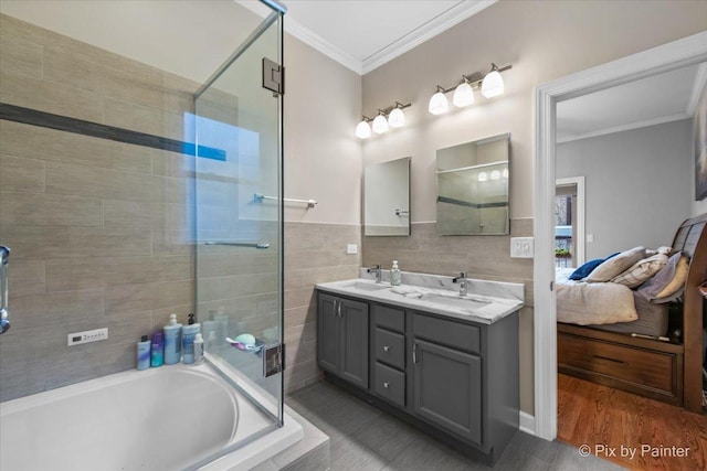 2447 W Walton St Unit 1, Chicago, IL 60622 - full bathroom featuring ornamental molding, tiled tub, a tile shower, double vanity, and connected bathroom