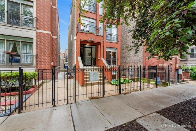 2447 W Walton St Unit 1, Chicago, IL 60622 - view of exterior entry featuring brick siding