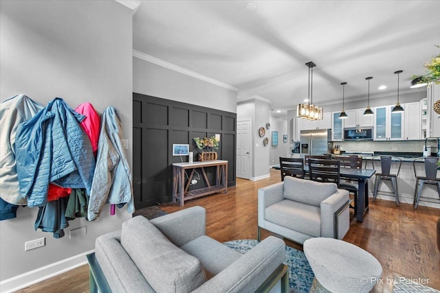 2447 W Walton St Unit 1, Chicago, IL 60622 - living area with ornamental molding, wood finished floors, recessed lighting, and baseboards