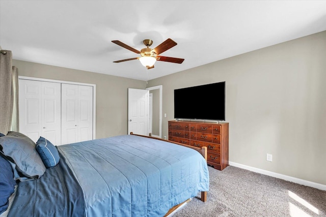 bedroom featuring carpet floors, baseboards, a closet, and ceiling fan