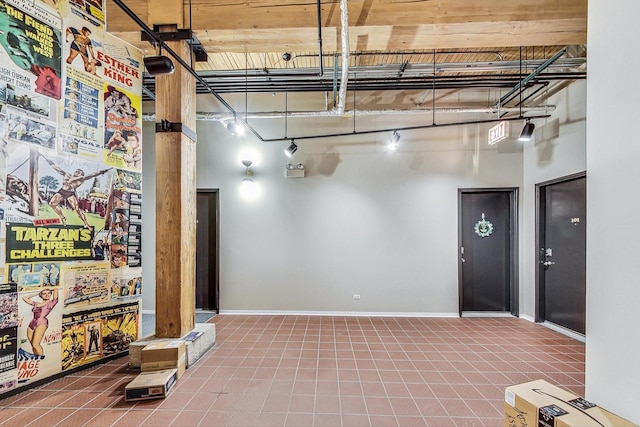 below grade area featuring baseboards