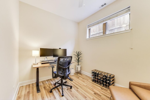 office space featuring wood finished floors and baseboards