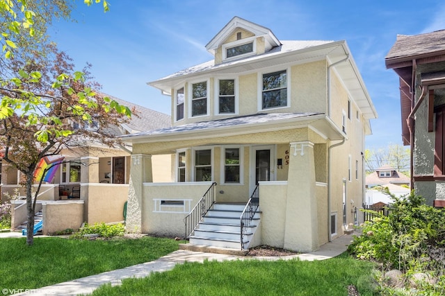 605 Home Ave, Oak Park, IL 60304 - traditional style home featuring covered porch, stucco siding, and roof with shingles