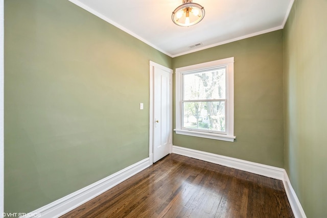 605 Home Ave, Oak Park, IL 60304 - unfurnished room featuring baseboards, dark wood-style floors, and ornamental molding