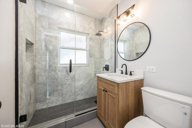 605 Home Ave, Oak Park, IL 60304 - bathroom with toilet, a stall shower, and vanity