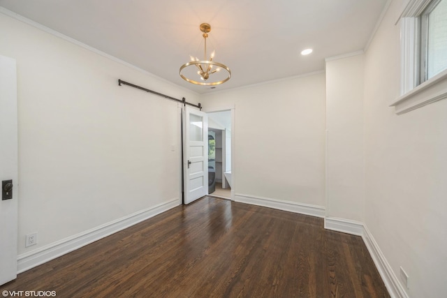 605 Home Ave, Oak Park, IL 60304 - spare room with a barn door, a chandelier, wood finished floors, baseboards, and healthy amount of natural light