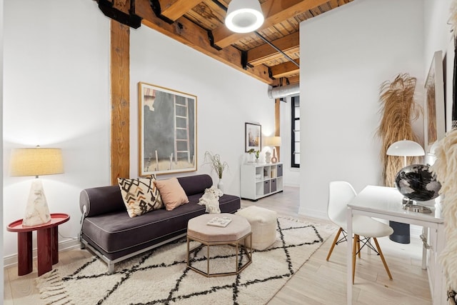 223 W Lake St Unit 3N, Chicago, IL 60606 - living area featuring wood ceiling, beamed ceiling, wood finished floors, and baseboards