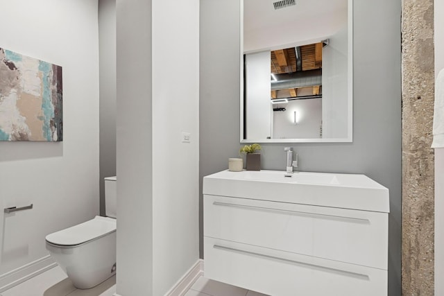 223 W Lake St Unit 3N, Chicago, IL 60606 - bathroom with toilet, vanity, and baseboards