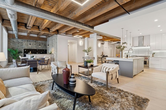 223 W Lake St Unit 3N, Chicago, IL 60606 - living area with light wood-type flooring and beam ceiling
