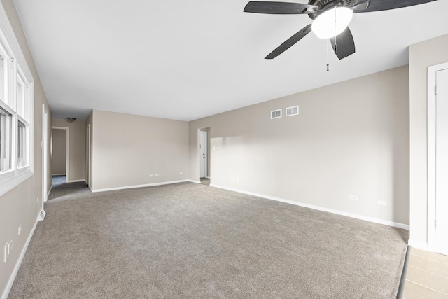 15252 Larkspur Ln, Orland Park, IL 60462 - spare room with baseboards, ceiling fan, and light carpet