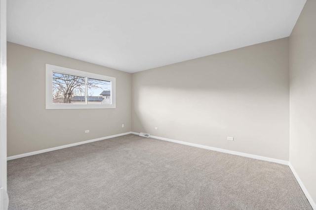15252 Larkspur Ln, Orland Park, IL 60462 - carpeted empty room with baseboards
