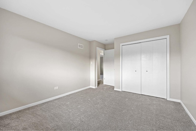 15252 Larkspur Ln, Orland Park, IL 60462 - unfurnished bedroom featuring baseboards, carpet floors, and a closet