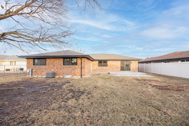 15252 Larkspur Ln, Orland Park, IL 60462 - back of property with a patio, brick siding, and central AC