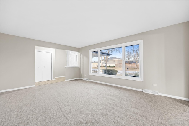 15252 Larkspur Ln, Orland Park, IL 60462 - unfurnished living room featuring carpet floors and baseboards