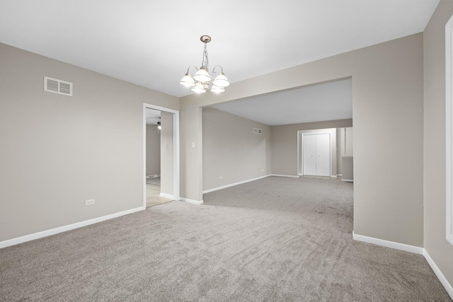 15252 Larkspur Ln, Orland Park, IL 60462 - spare room featuring baseboards, a chandelier, and carpet flooring