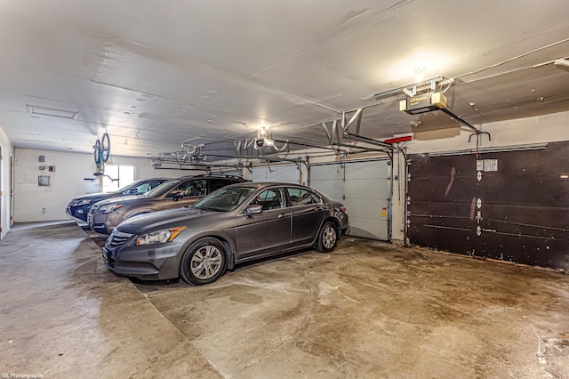 8245 Willow Dr Unit 43D, Palos Hills, IL 60465 - garage featuring a garage door opener