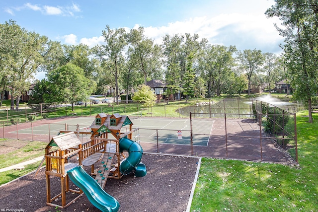 8245 Willow Dr Unit 43D, Palos Hills, IL 60465 - community jungle gym with a tennis court and view of scattered trees