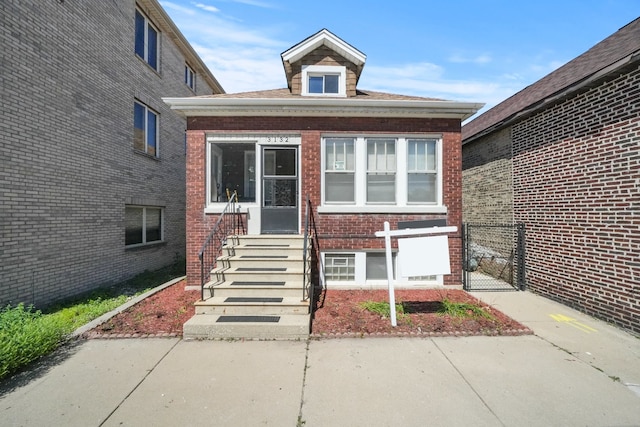 3132 Oak Park Ave, Berwyn, IL 60402 - view of front of property featuring a gate, brick siding, entry steps, and fence