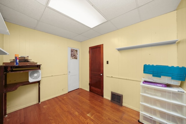3132 Oak Park Ave, Berwyn, IL 60402 - miscellaneous room with a drop ceiling, wood finished floors, and baseboards