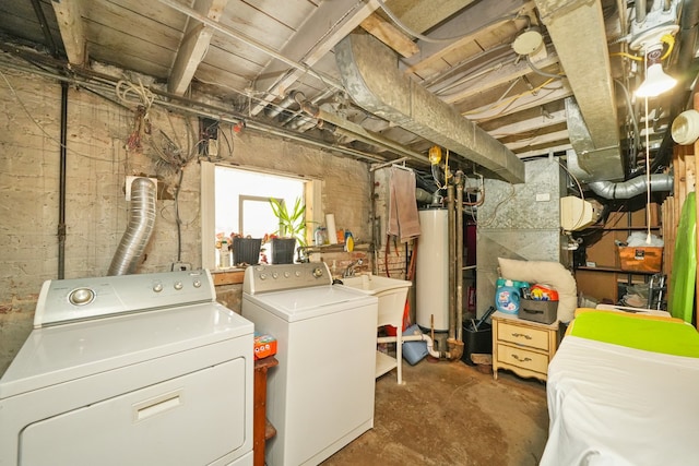 3132 Oak Park Ave, Berwyn, IL 60402 - basement featuring separate washer and dryer, gas water heater, and a sink