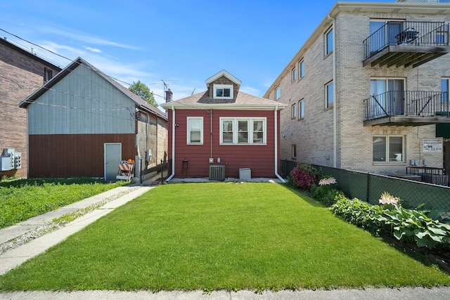 3132 Oak Park Ave, Berwyn, IL 60402 - back of property with central AC and a shingled roof