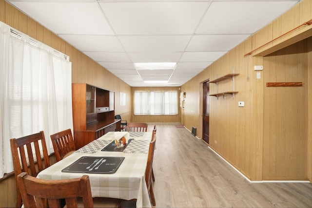 3132 Oak Park Ave, Berwyn, IL 60402 - dining space with light wood-style flooring, wooden walls, and a paneled ceiling