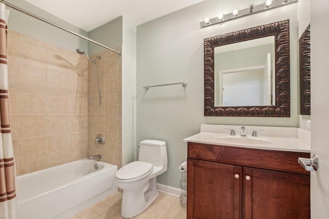 full bath featuring tile patterned floors, toilet, shower / bath combo, vanity, and baseboards