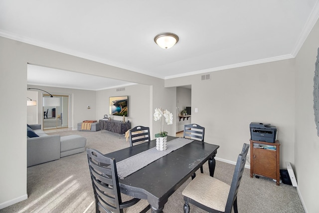 407 Meadow Ave, Frankfort, IL 60423 - carpeted dining room with crown molding and baseboards