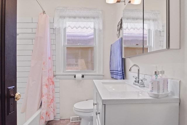 full bath featuring toilet and vanity
