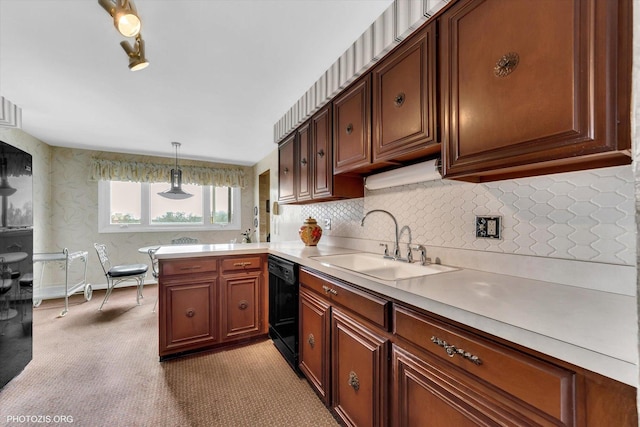 1535 Forest Ave Unit 504, River Forest, IL 60305 - kitchen featuring black dishwasher, a sink, light countertops, a peninsula, and light colored carpet