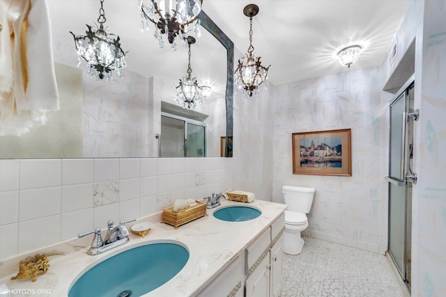 1535 Forest Ave Unit 504, River Forest, IL 60305 - full bath featuring toilet, a shower stall, double vanity, a chandelier, and baseboards
