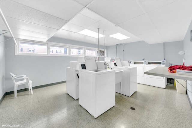 1535 Forest Ave Unit 504, River Forest, IL 60305 - community laundry room featuring washer and dryer and baseboards