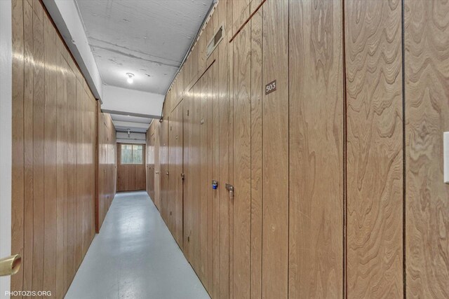 1535 Forest Ave Unit 504, River Forest, IL 60305 - corridor with wooden walls and concrete floors