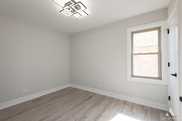 10925 Lyman Ave, Chicago Ridge, IL 60415 - spare room featuring light wood-style flooring and baseboards