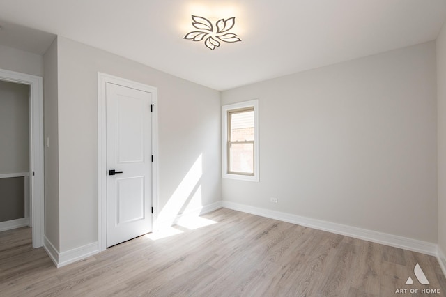 10925 Lyman Ave, Chicago Ridge, IL 60415 - unfurnished room with light wood-style floors and baseboards
