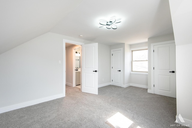 10925 Lyman Ave, Chicago Ridge, IL 60415 - additional living space with carpet, baseboards, and vaulted ceiling