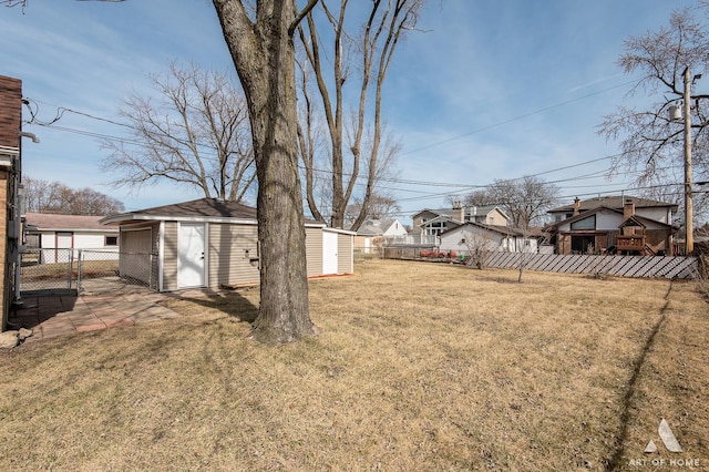 10925 Lyman Ave, Chicago Ridge, IL 60415 - view of yard featuring a storage unit, an outbuilding, and a residential view