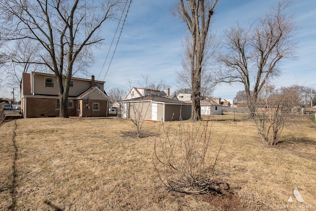 10925 Lyman Ave, Chicago Ridge, IL 60415 - view of yard featuring an outbuilding and an attached garage