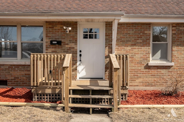 10925 Lyman Ave, Chicago Ridge, IL 60415 - view of exterior entry with brick siding and roof with shingles