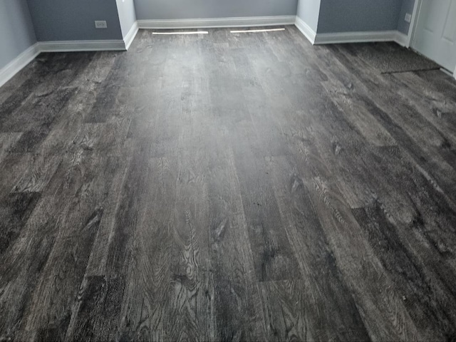22 E 118th St, Chicago, IL 60628 - detailed view of baseboards and wood finished floors