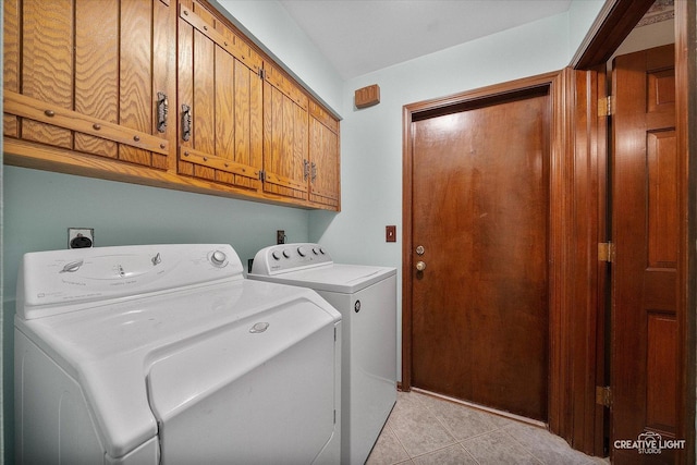 42W325 Jens Jensen Ln, Saint Charles, IL 60175 - washroom with independent washer and dryer, cabinet space, and light tile patterned floors