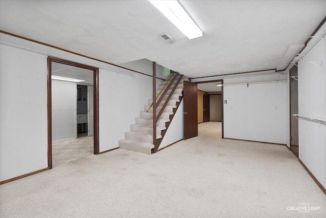 42W325 Jens Jensen Ln, Saint Charles, IL 60175 - finished below grade area with light colored carpet, stairs, and baseboards