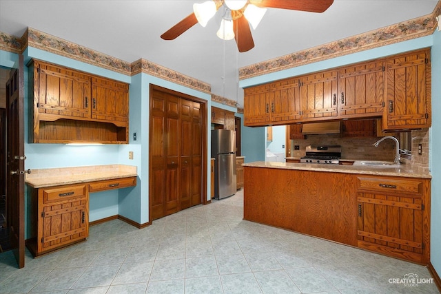 42W325 Jens Jensen Ln, Saint Charles, IL 60175 - kitchen with stainless steel appliances, a sink, range hood, ceiling fan, and backsplash