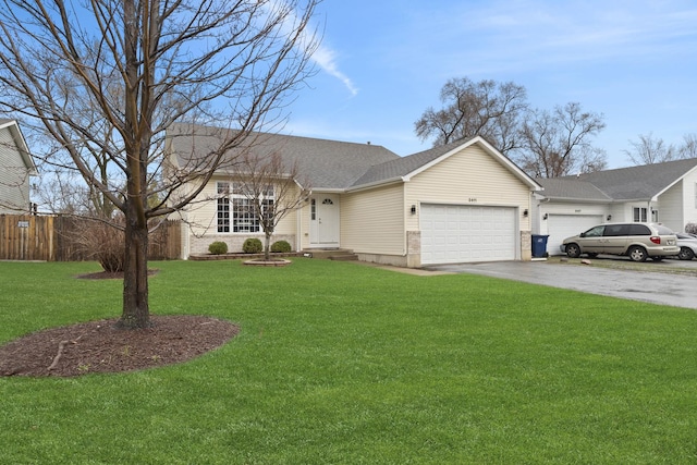 ranch-style home with an attached garage, concrete driveway, and roof with shingles