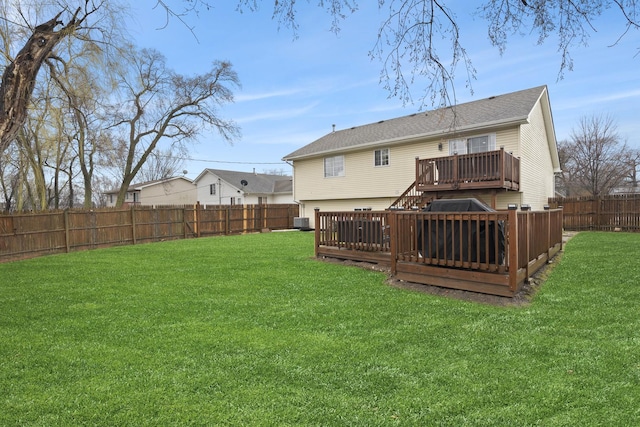 rear view of property featuring a deck and stairway