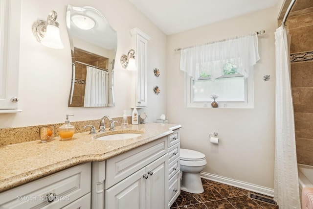 354 Richmond Ln, Lakewood, IL 60014 - full bathroom featuring toilet, tiled shower, vanity, and baseboards