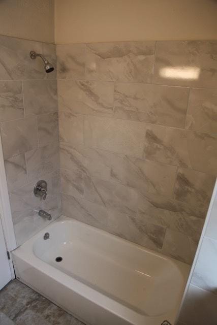 bathroom featuring tub / shower combination