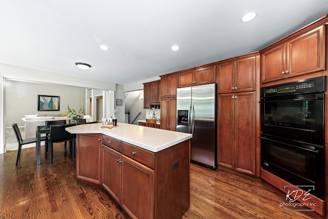 480 De Lasalle Ave, Naperville, IL 60565 - kitchen featuring stainless steel fridge, dark wood-type flooring, a center island, light countertops, and recessed lighting